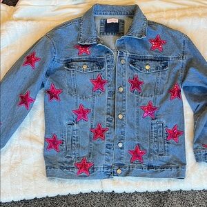 Pink Lily light wash denim jacket with pink sequins star patches
